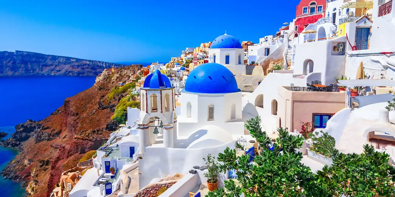 Experience the charming town of Santorini, Greece - Explore with the Top Tourist Passes from Best City Pass.
